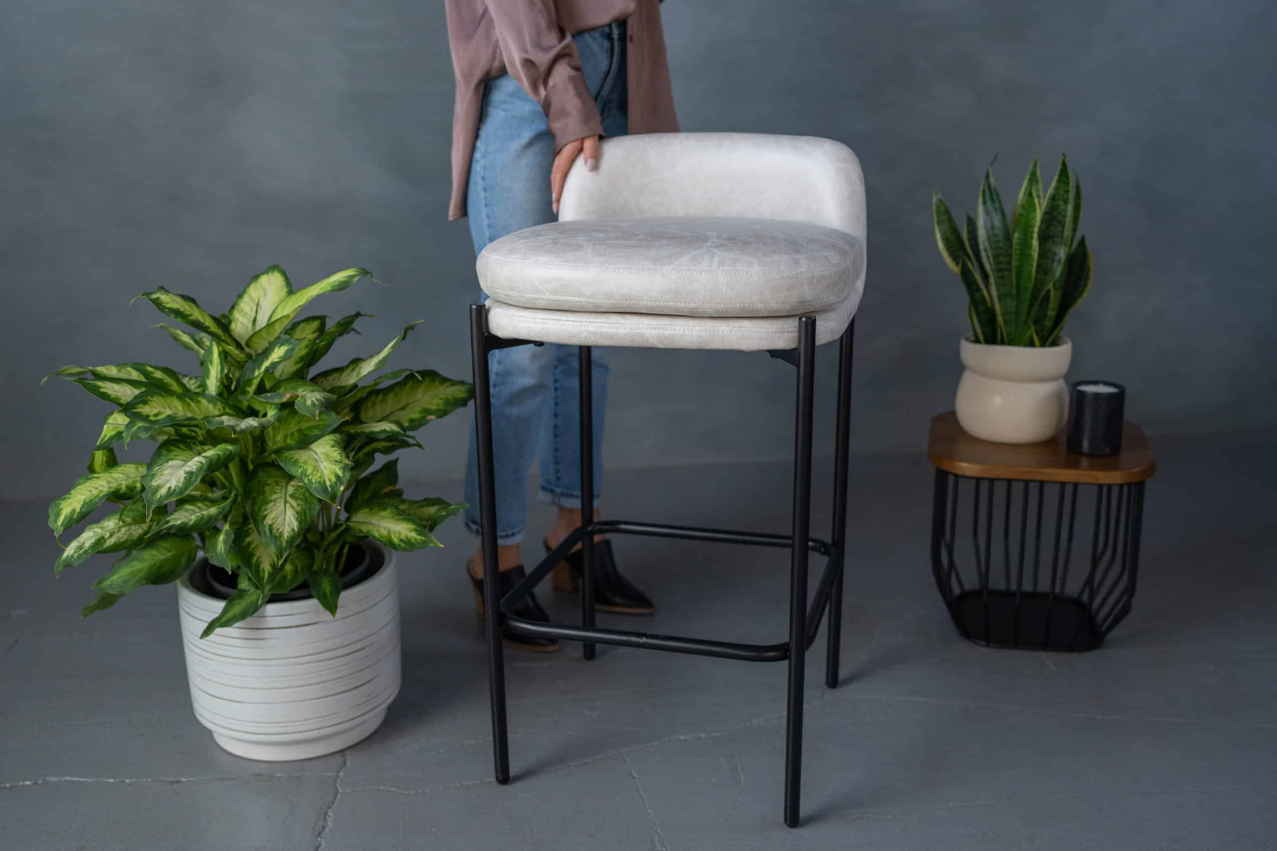 Consider a Wovenbyrd Modern Mid-Back Counter Stool in Distressed Tan Faux Leather as a Christmas gift this year.