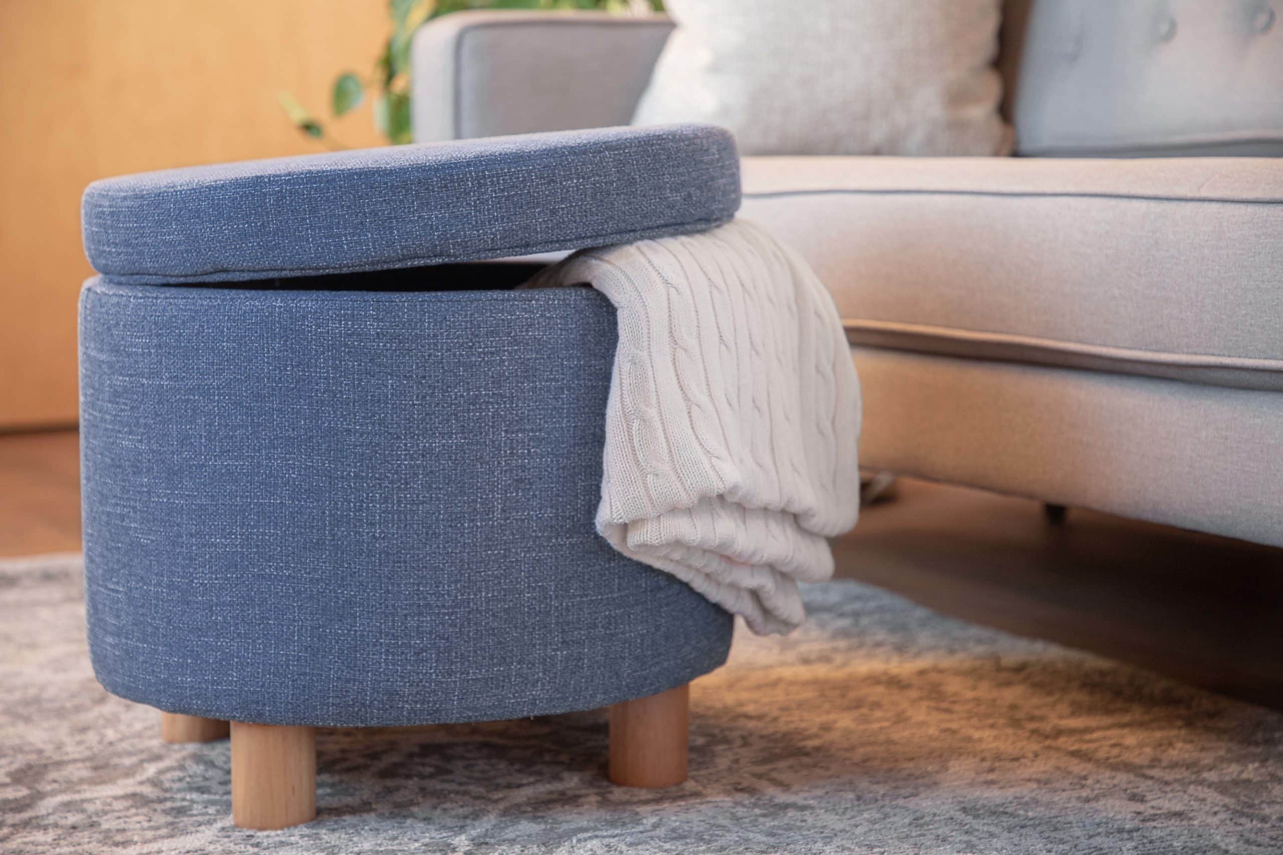 A blue Wovenbyrd Round Storage Ottoman with Lift Off Lid makes a great Christmas gift.